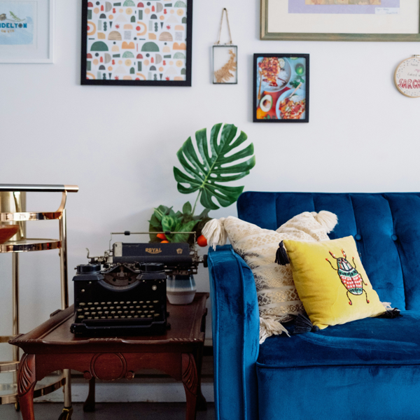 Blue sofa and pictures on the wall