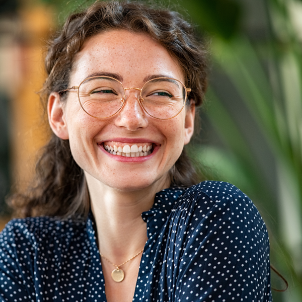 Smiling woman in glasses